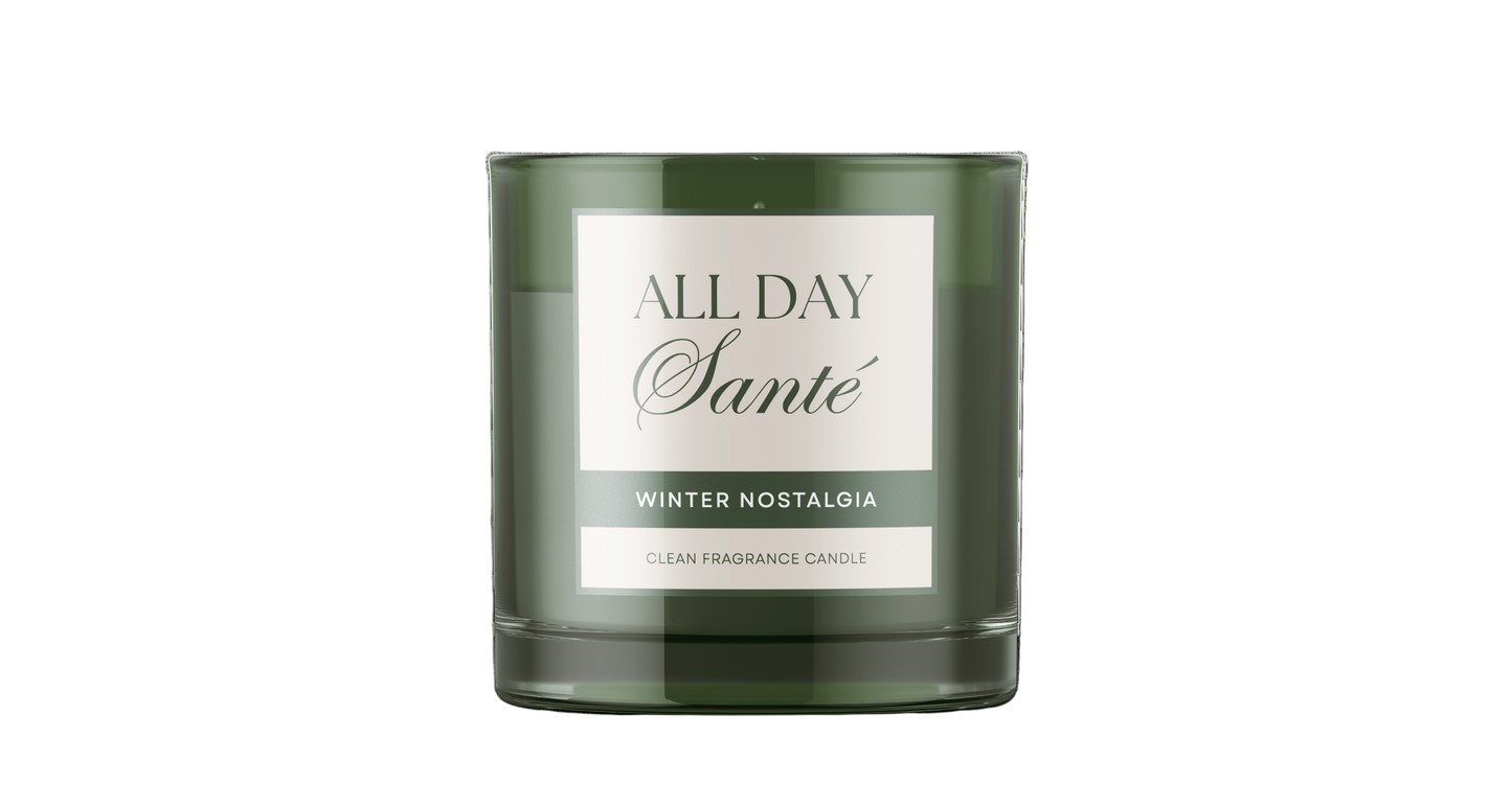Green candle with a label on a white background